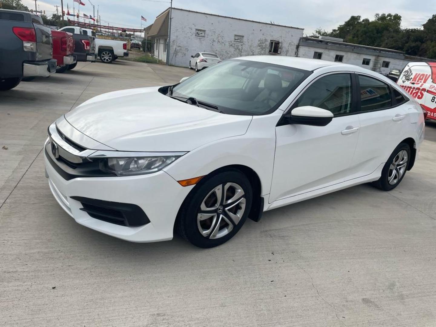 2017 WHITE HONDA CIVIC LX (19XFC2F52HE) with an 2.0L engine, Continuously Variable transmission, located at 4415 NE 28th St., Haltom City, TX, 76117, (817) 222-9334, 0.000000, 0.000000 - Photo#0